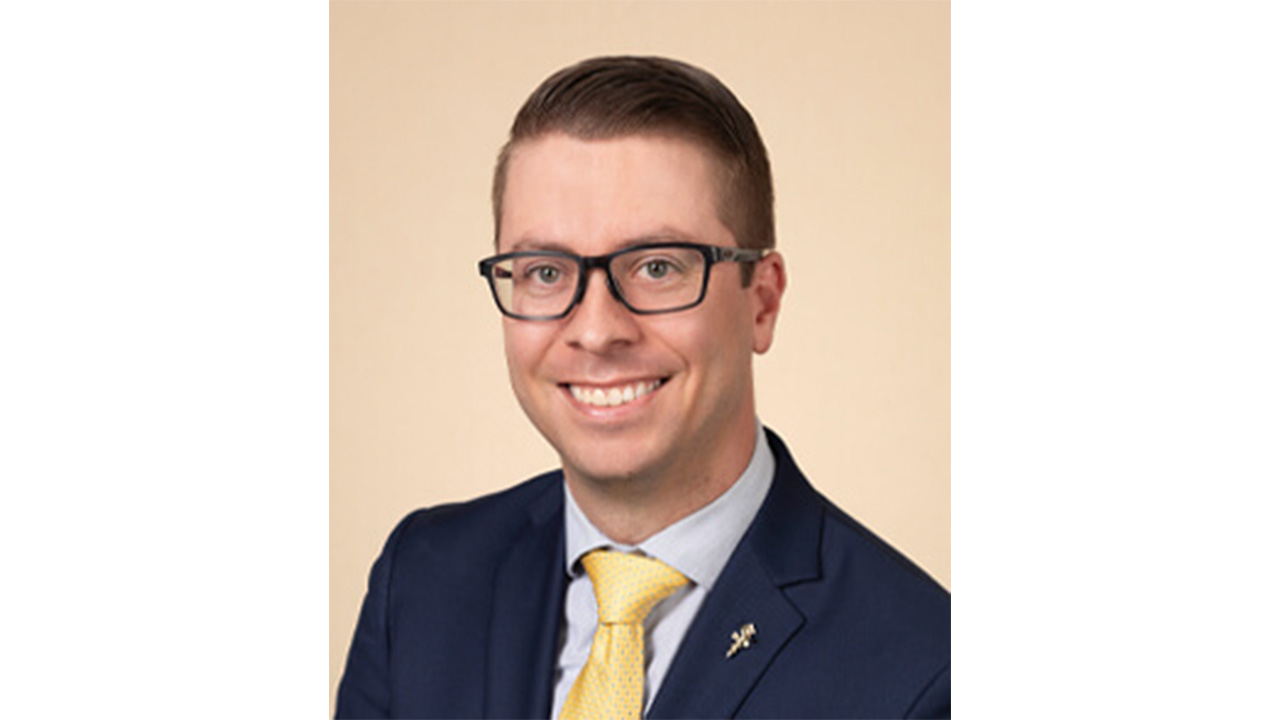 Dr. Zettler smiling at the camera