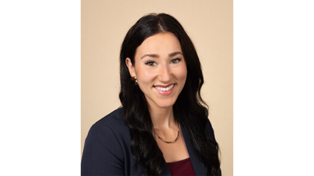 Dr. Rentmeester smiling at the camera