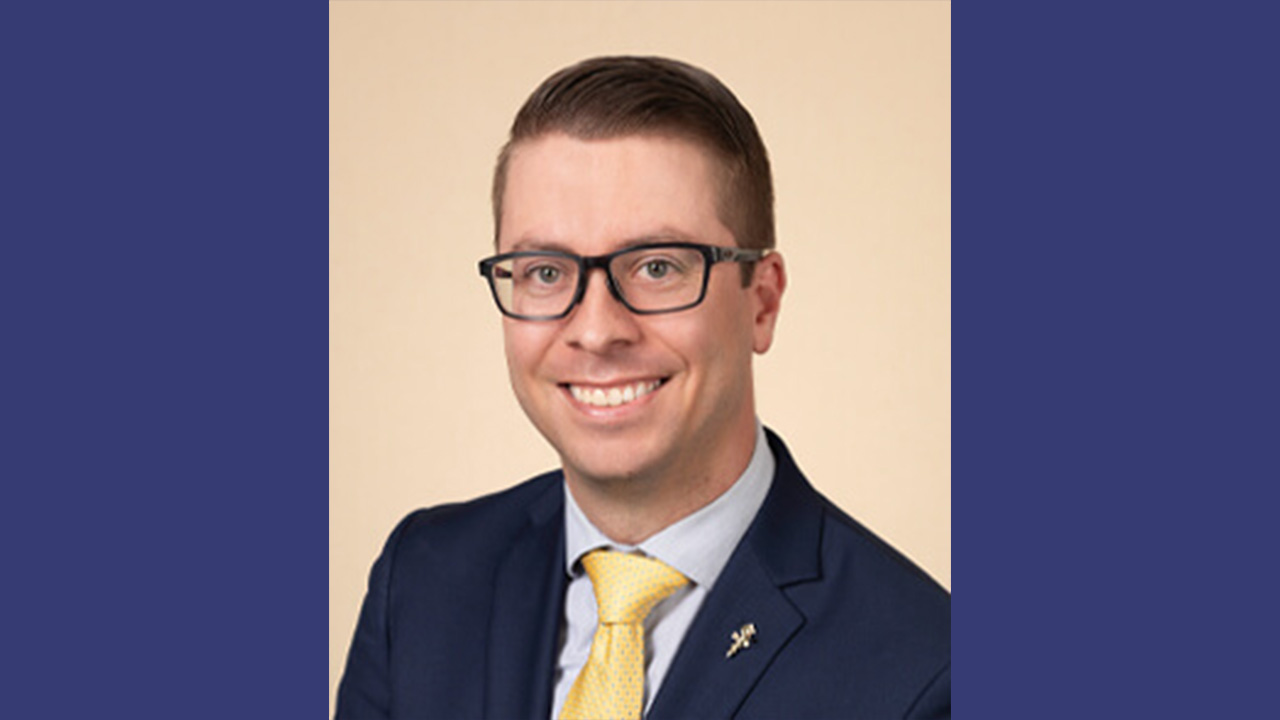 Dr. Zettler smiling at the camera