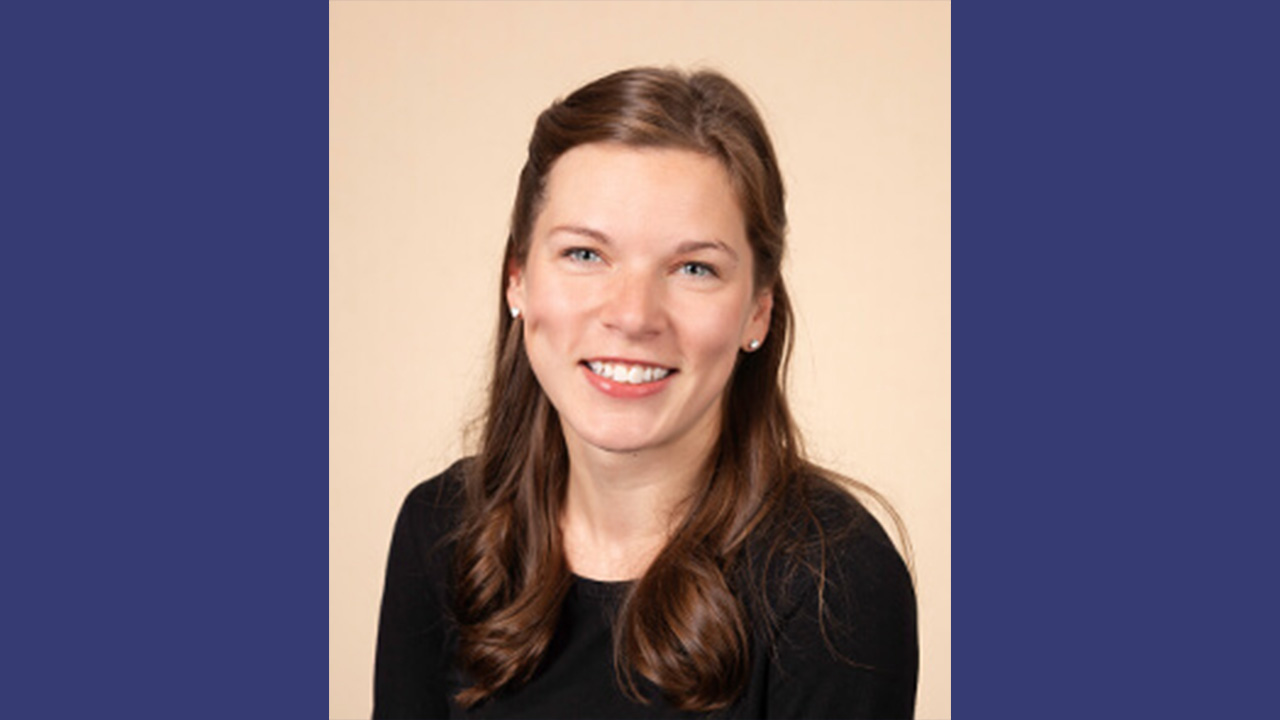 Dr. Reid smiling at the camera