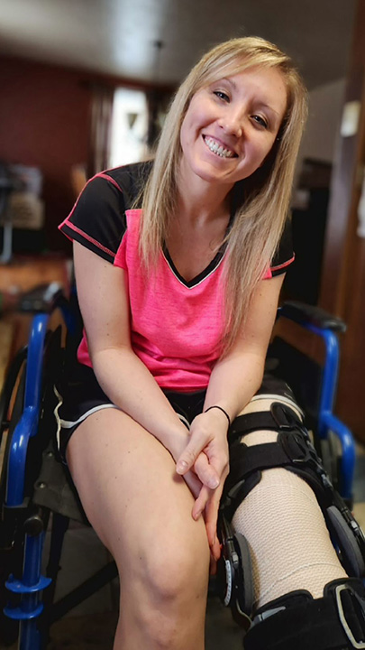 picture of Paige with leg in stabilizer