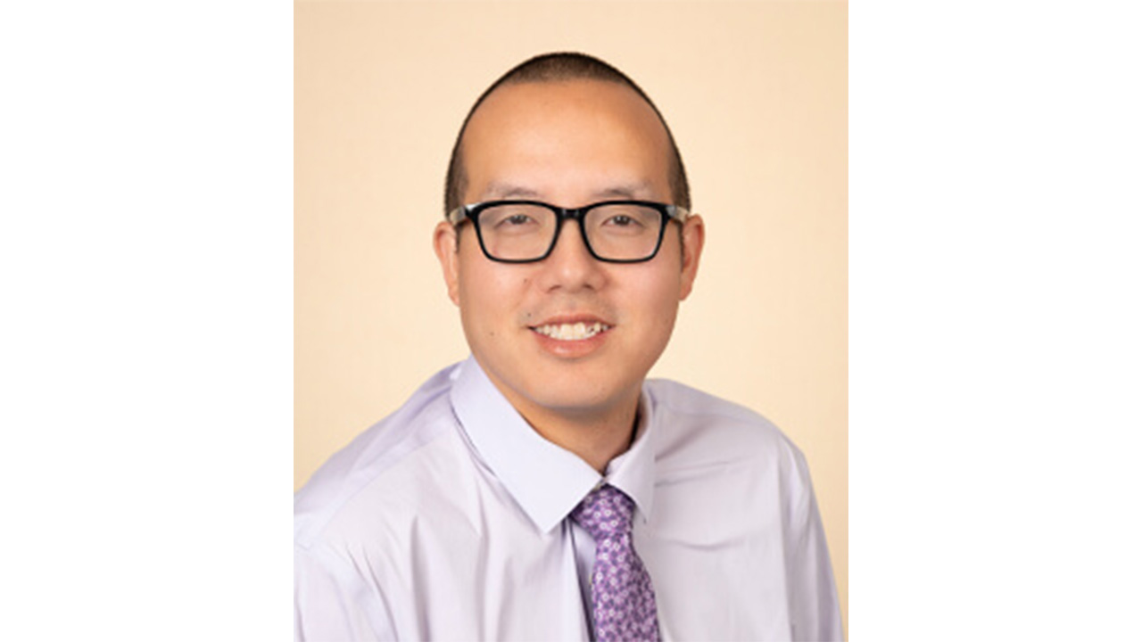 Dr. Chee Nou Lee smiling at the camera