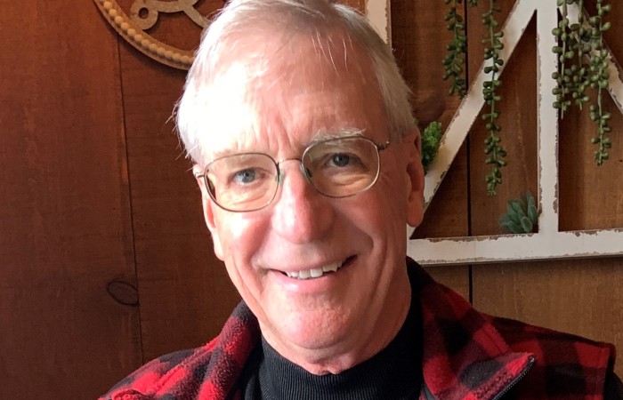 Charlie smiling at the camera