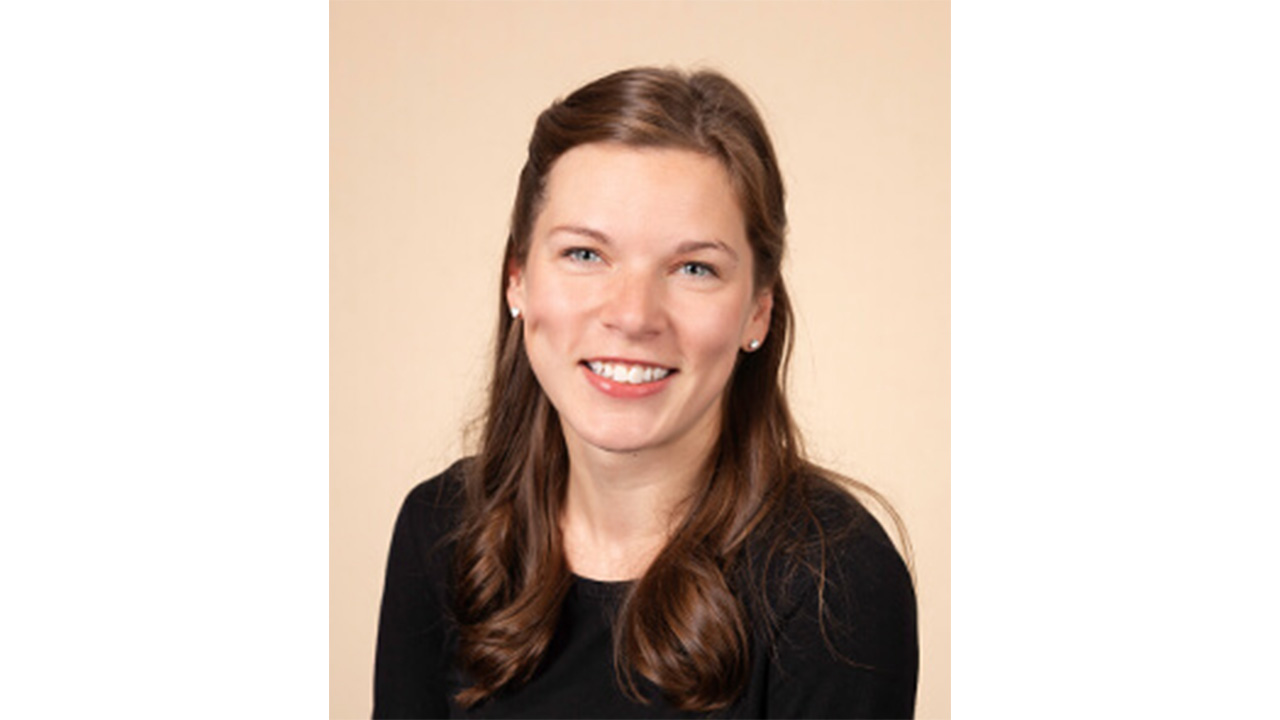 Dr. Reid smiling at the camera