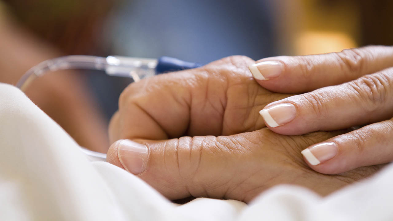 Hand with IV tube