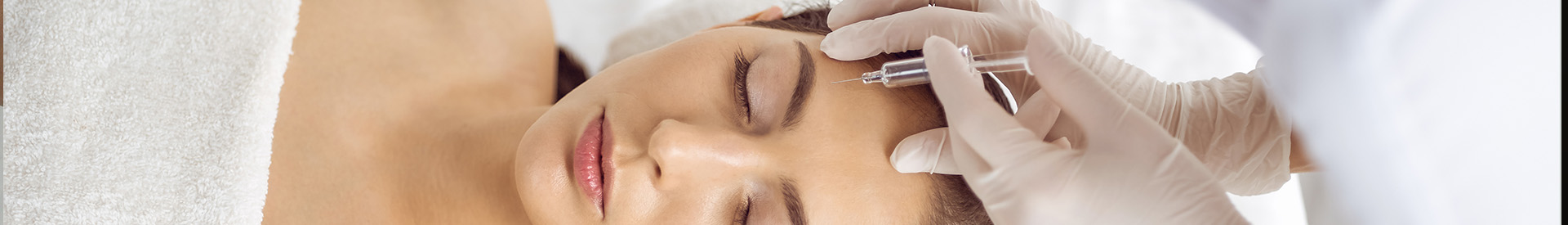 Woman Getting Botox in Forehead